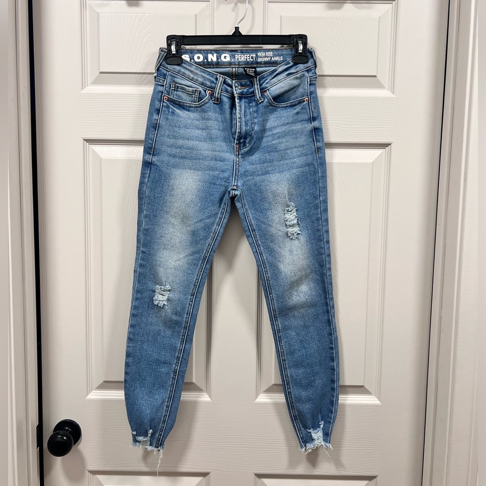 Distressed Blue Jeans